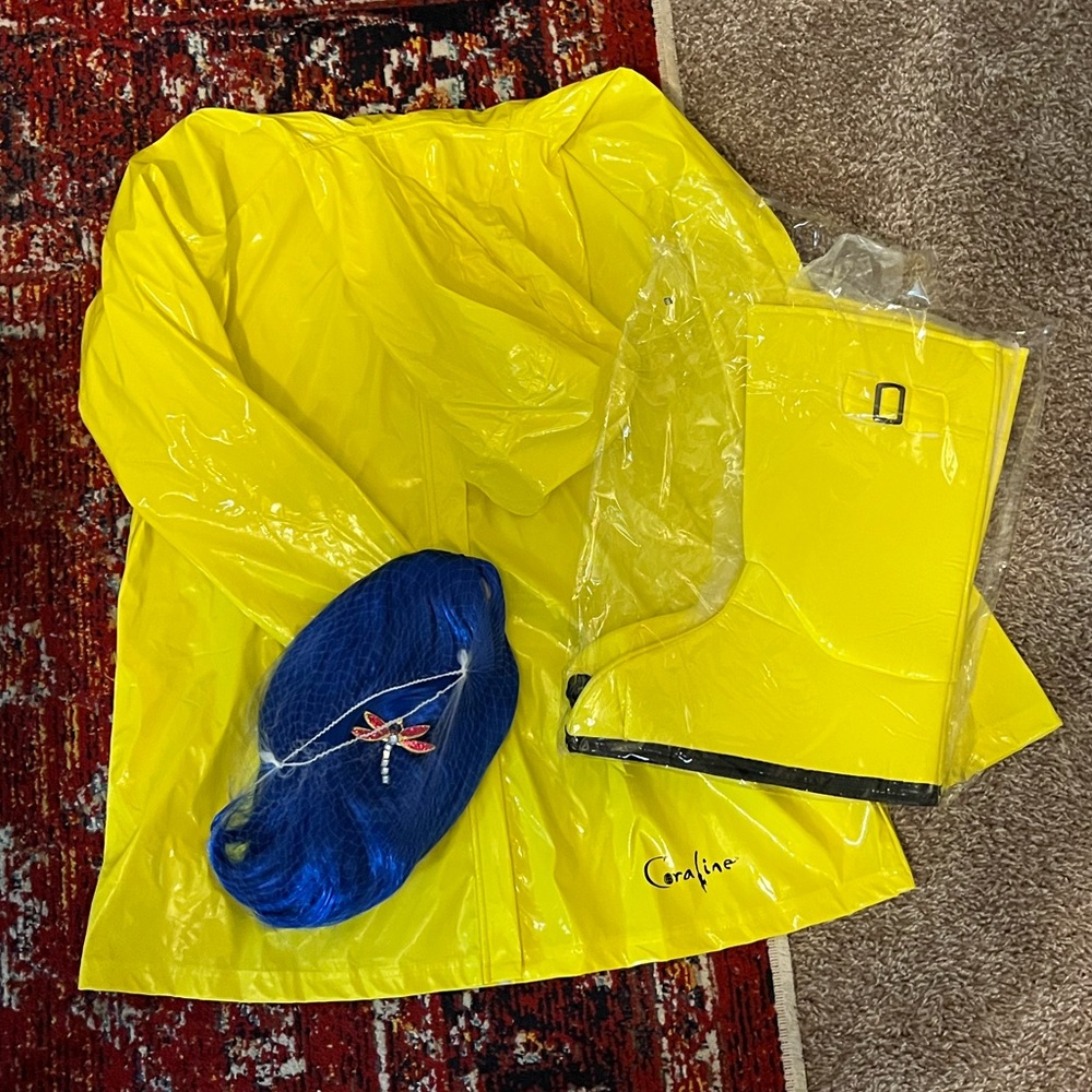 Completely BRAND NEW full Coraline costume! Never used and in original packaging